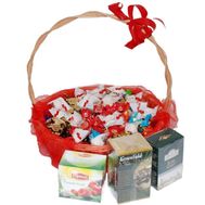 Basket of sweets from sweets and tea