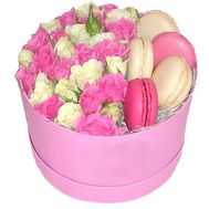 Shrub roses and macaroons in a box