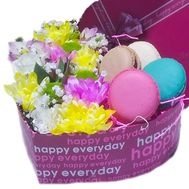 Heart with flowers and macaroons in a box