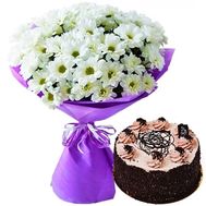 Bouquet of daisy chrysanthemums and cake