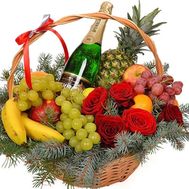 Basket of fruit, champagne and flowers