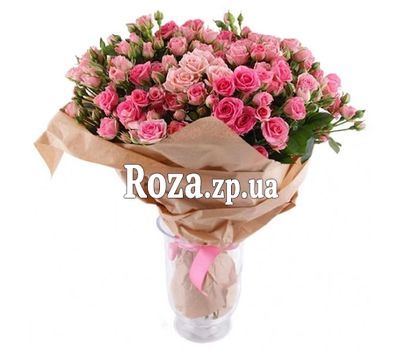 Bouquet of bush roses in kraft paper Bouquet of bush roses in kraft paper