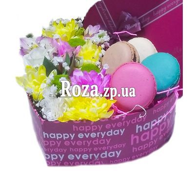 Heart with flowers and macaroons in a box Heart with flowers and macaroons in a box