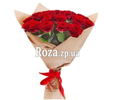 Букет червоних троянд в папері Букет червоних троянд в папері