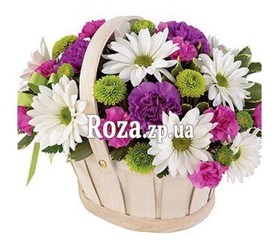 Basket of flowers from chrysanthemums and carnations Basket of flowers from chrysanthemums and carnations