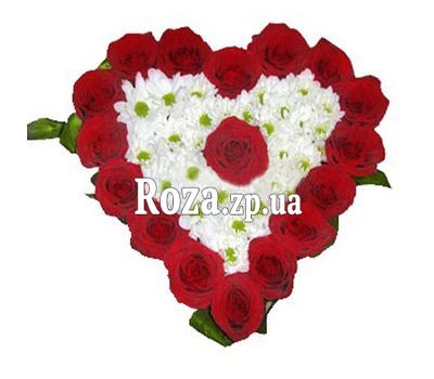 Heart-shaped composition of roses and chrysanthemums Heart-shaped composition of roses and chrysanthemums